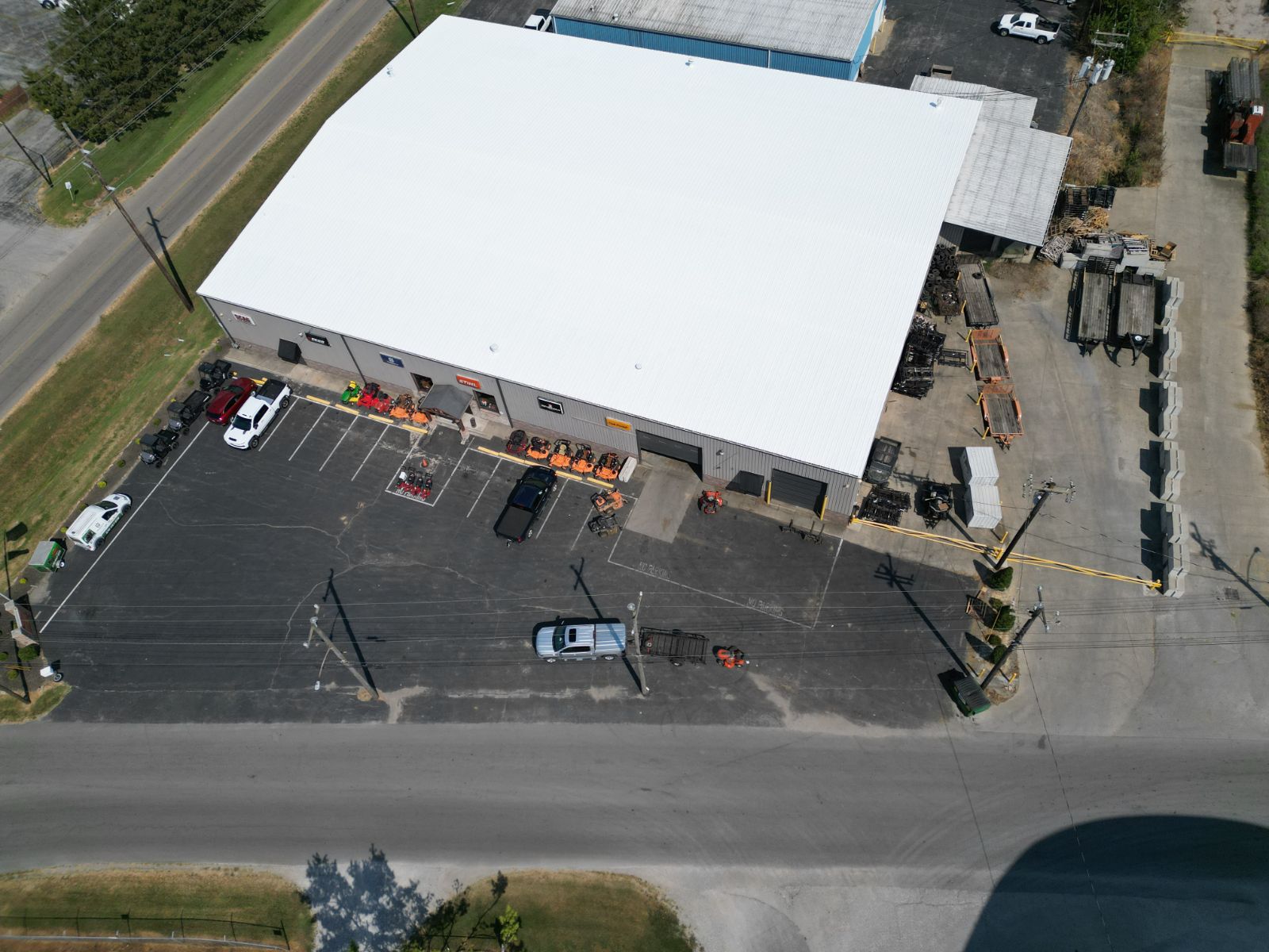 Drone view straight down on a fully coated commercial metal roof