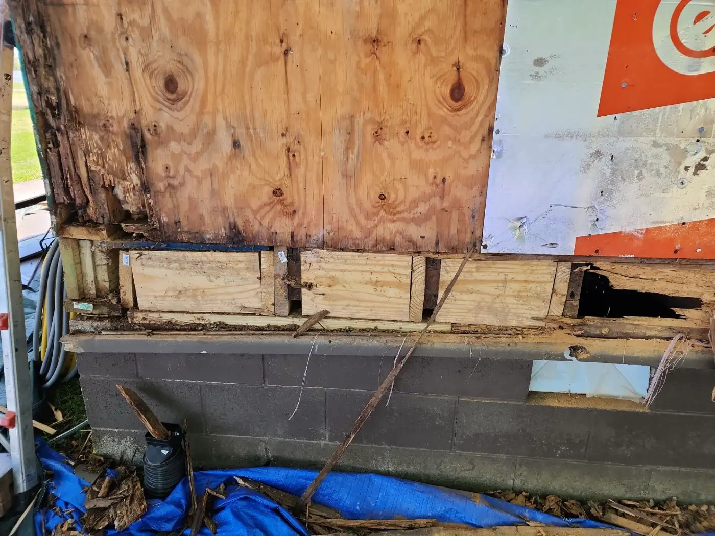 New rim joist and blocking installed on the block foundation